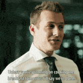a man in a suit and tie is talking about cooking breakfast tomorrow