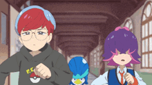 a boy with red hair is wearing a sweatshirt that says t.c.