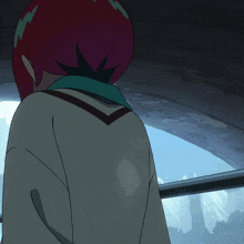a girl with red hair and a green scarf looks out of a window