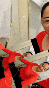a woman in a red top is laying in front of a mirror with the words picsart at the bottom