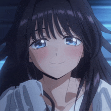 a close up of a girl with blue eyes and a white shirt