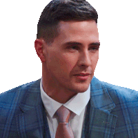a man in a suit and tie is looking to his left
