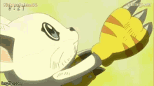 a cartoon cat and a tiger are fighting each other in a field .