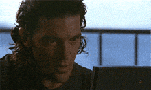 a close up of a man 's face looking at something