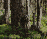 a man in a suit and tie is standing in the woods near a grave