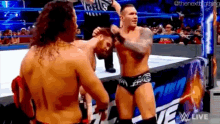 Randy Orton Shinsuke Nakamura GIF - Randy Orton Shinsuke Nakamura Throws GIFs