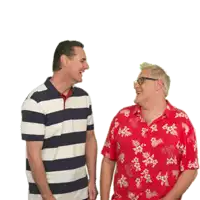 two men are standing next to each other and one is wearing a red floral shirt