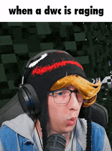 a man wearing headphones and a hat with the words " when a dwc is raging " above him