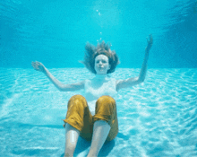 Felicia Montealegre Sitting Down In A Pool Maestro GIF