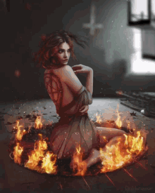a woman with a pentagram on her back is surrounded by flames