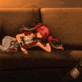 a red haired anime girl is laying on a couch