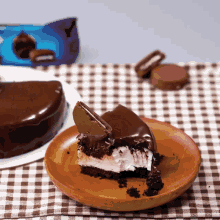 a slice of chocolate cake with a bite taken out of it