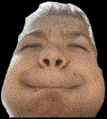 a close up of a person 's face with a funny face