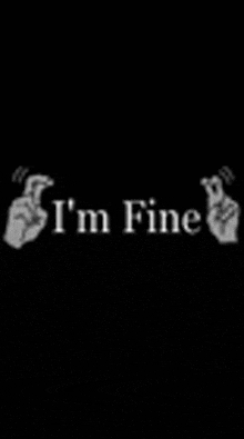 a black and white photo of two hands with the words `` i 'm fine '' written in white letters on a black background .