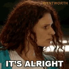 a woman with red hair says it 's alright in front of a wentworth logo