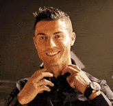 a man wearing a watch and a shirt that says rcr7