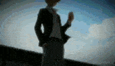 a man in a suit is standing in front of a cloudy sky with tssuwukii written on the bottom