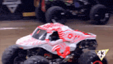 a monster truck that has the number 43 on the side
