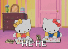 two hello kitty cartoon characters are sitting on the floor in a room .