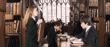 Big Book GIF - Harry Potter Daniel Radcliffe Hermione Granger GIFs