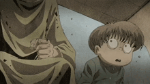 a cartoon drawing of a man and a child with big eyes
