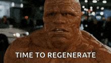 a close up of a man with the words `` time to regenerate '' written on his face .