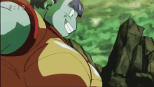 a cartoon character is standing on top of a rocky hill with the time 9:19 on the bottom of the screen .