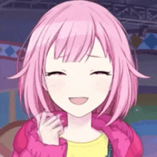 a close up of a girl with pink hair and a pink jacket smiling .