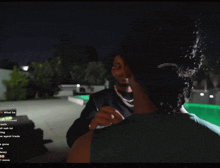 a man and a woman are standing next to each other in front of a pool and the words then walk are on the screen