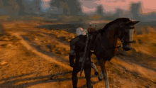 Mounting The Horse Geralt Of Rivia GIF - Mounting The Horse Geralt Of Rivia The Witcher GIFs