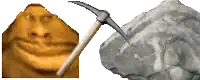 a close up of a pickaxe next to a large rock