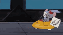 just married nibbles mouse driving newly wed