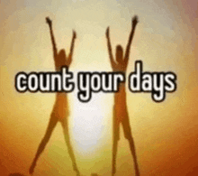 two people are jumping in the air with the words count your days above them .