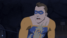 a man in a yellow and blue superhero costume with the letter s on his chest