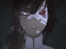 a close up of a person 's face with a bandage on it