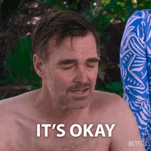 a shirtless man says " it 's okay " in a netflix ad