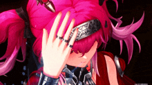 a close up of a pink haired anime character with a ring on her finger