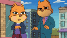 a man and a woman are standing next to each other in front of a building