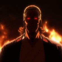 a man with red eyes is standing in front of a fire in the dark .