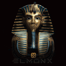 a statue of a pharaoh 's face with a blue and gold striped crown
