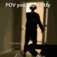 a blurred image of a person standing in a doorway with the caption pov you pop a titty