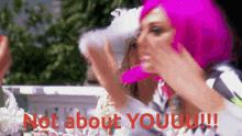 a woman in a pink wig says not about youuu !!!