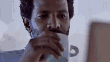 Drinking Coffee National Geographic GIF - Drinking Coffee National Geographic Sip GIFs