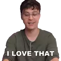 a man wearing glasses and a green shirt says " i love that "