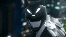 a close up of a person in a batman costume with glowing eyes