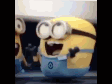 a close up of a minion with its mouth open