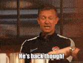 a man says he 's back though while wearing a canada jacket