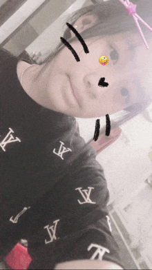 a girl taking a selfie with a smiley face on her face