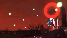 a girl with wings is surrounded by flames