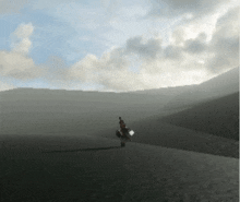 a person is standing in the middle of a foggy valley